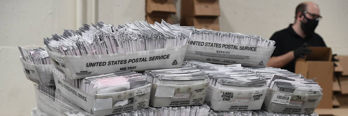 Mail-in ballots are processed