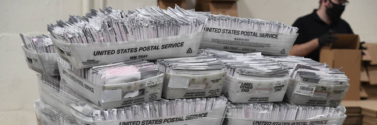Mail-in ballots in bins.