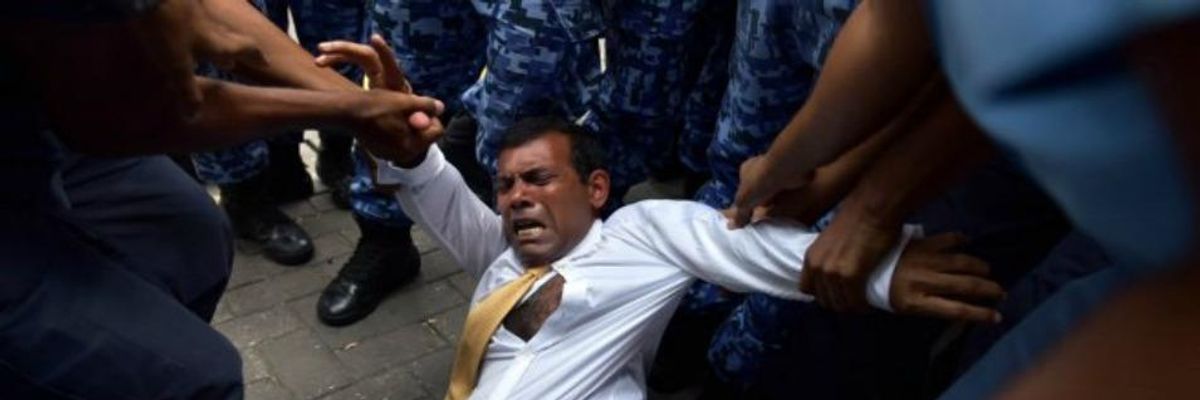 Climate Crusading Former Maldives Leader Arrested, Dragged Into Court