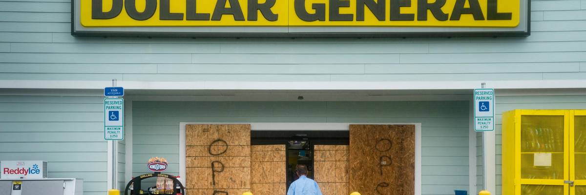 Man enters Dollar General.