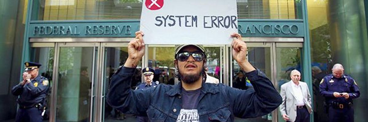 Man holding a sign that says: SYSTEM ERROR