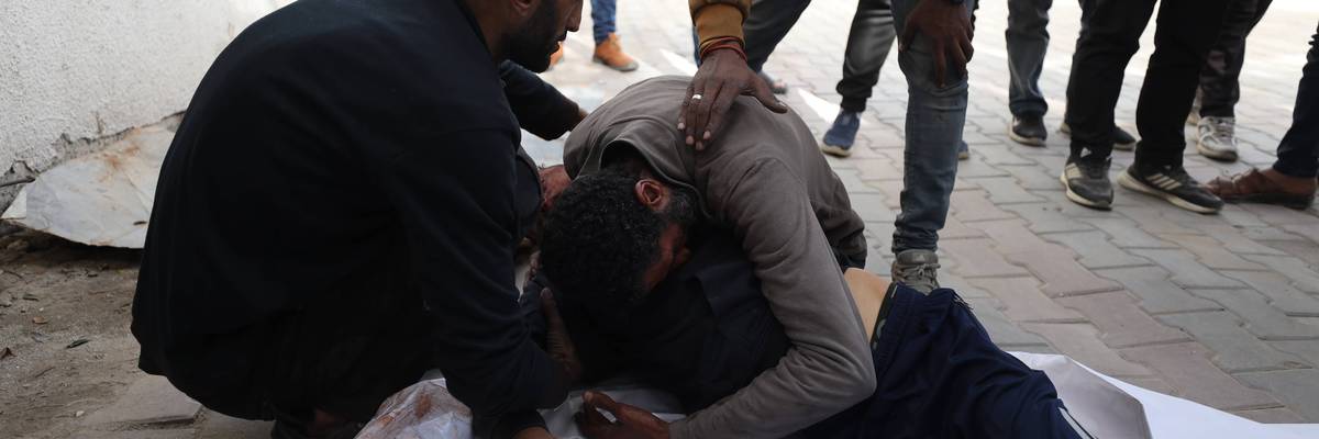 Man mourns killing of two teenagers