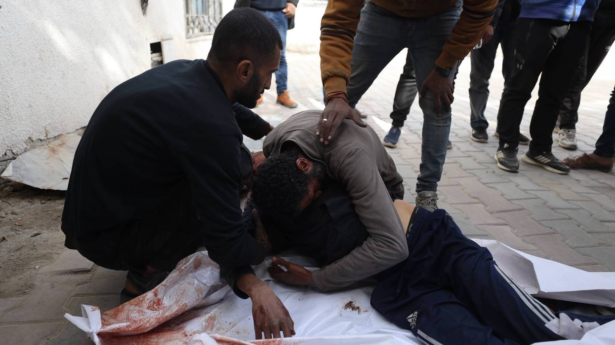 Man mourns killing of two teenagers