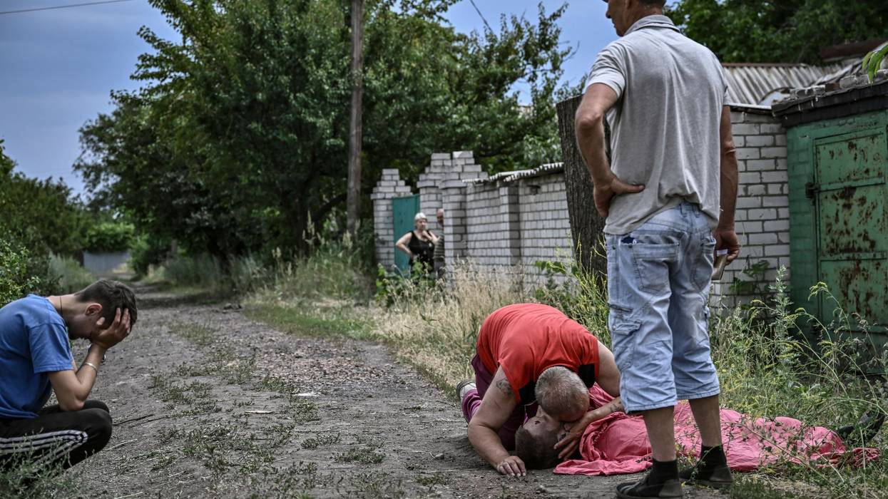 Man mourns victim of cluster bomb