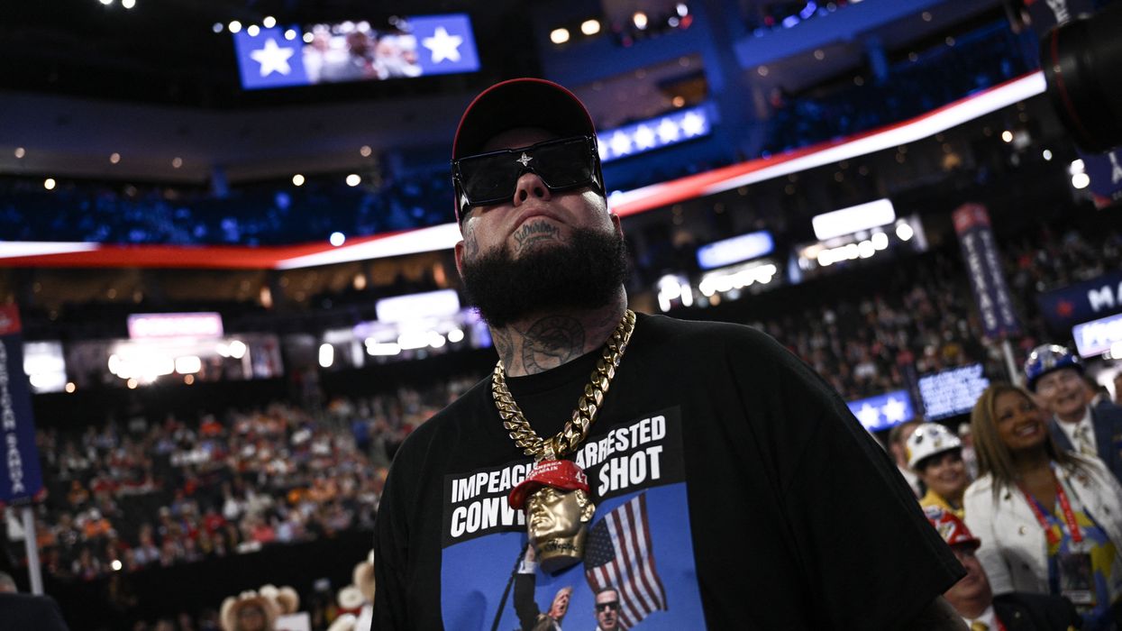 Man wears t-shirt of Trump after the assassination attempt.