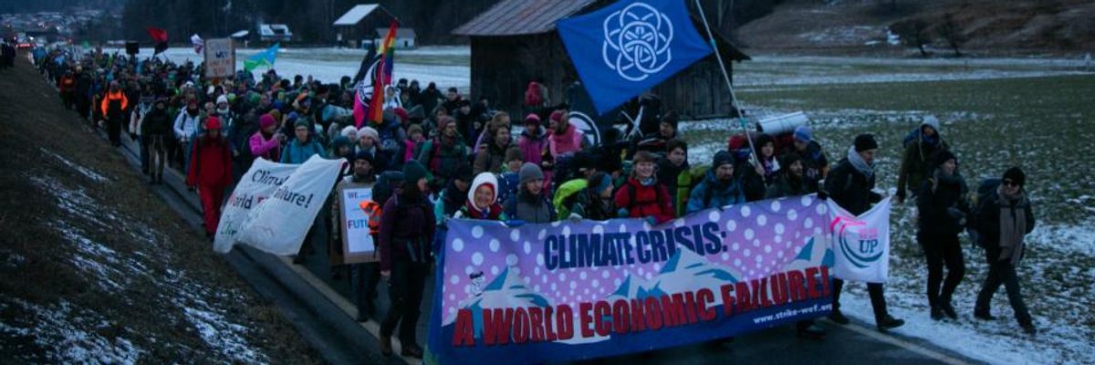 Earth Defenders March on Davos as Global Financial Elite Targeted for Funding Climate Destruction