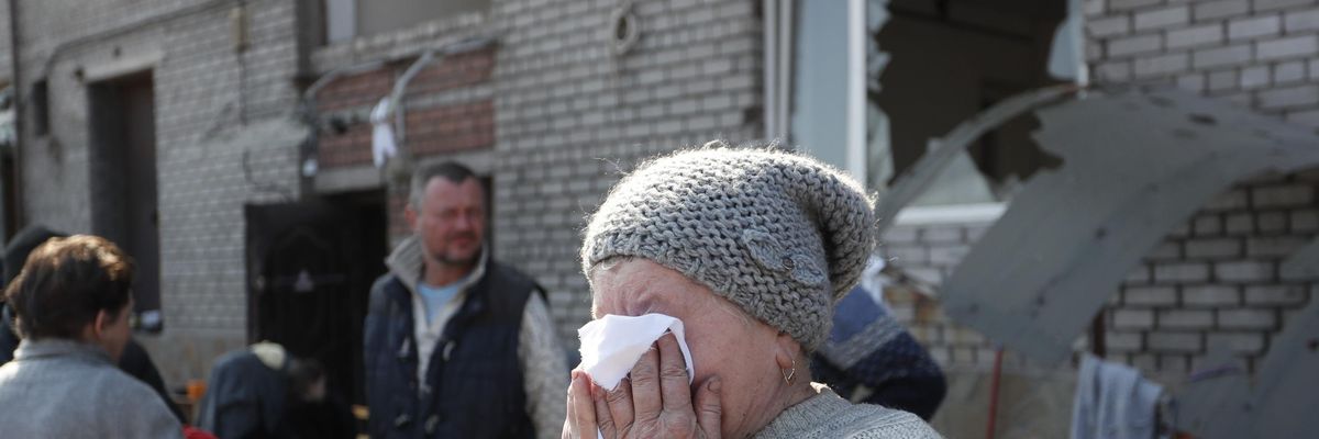 Mariupol residents are seen in the city