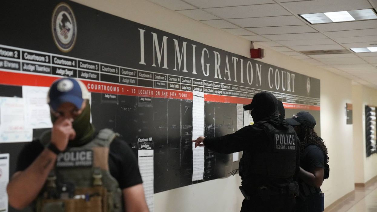 Masked federal officers lurk in an immigration court