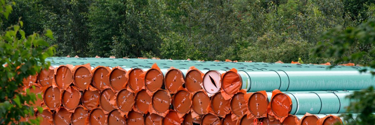 Materials for the Trans Mountain pipeline project sit in a storage lot outside British Columbia on June 6, 2021. (Photo: Cole Burston/AFP via Getty Images)