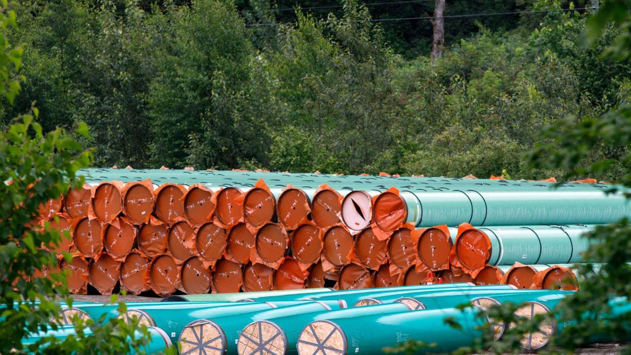 Materials for the Trans Mountain pipeline project sit in a storage lot outside British Columbia on June 6, 2021. (Photo: Cole Burston/AFP via Getty Images)