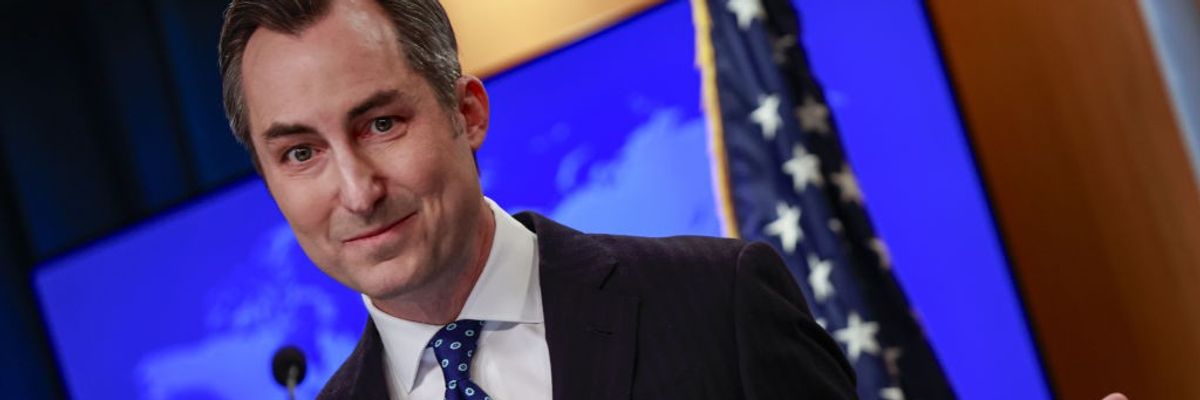 Matthew Miller smirks