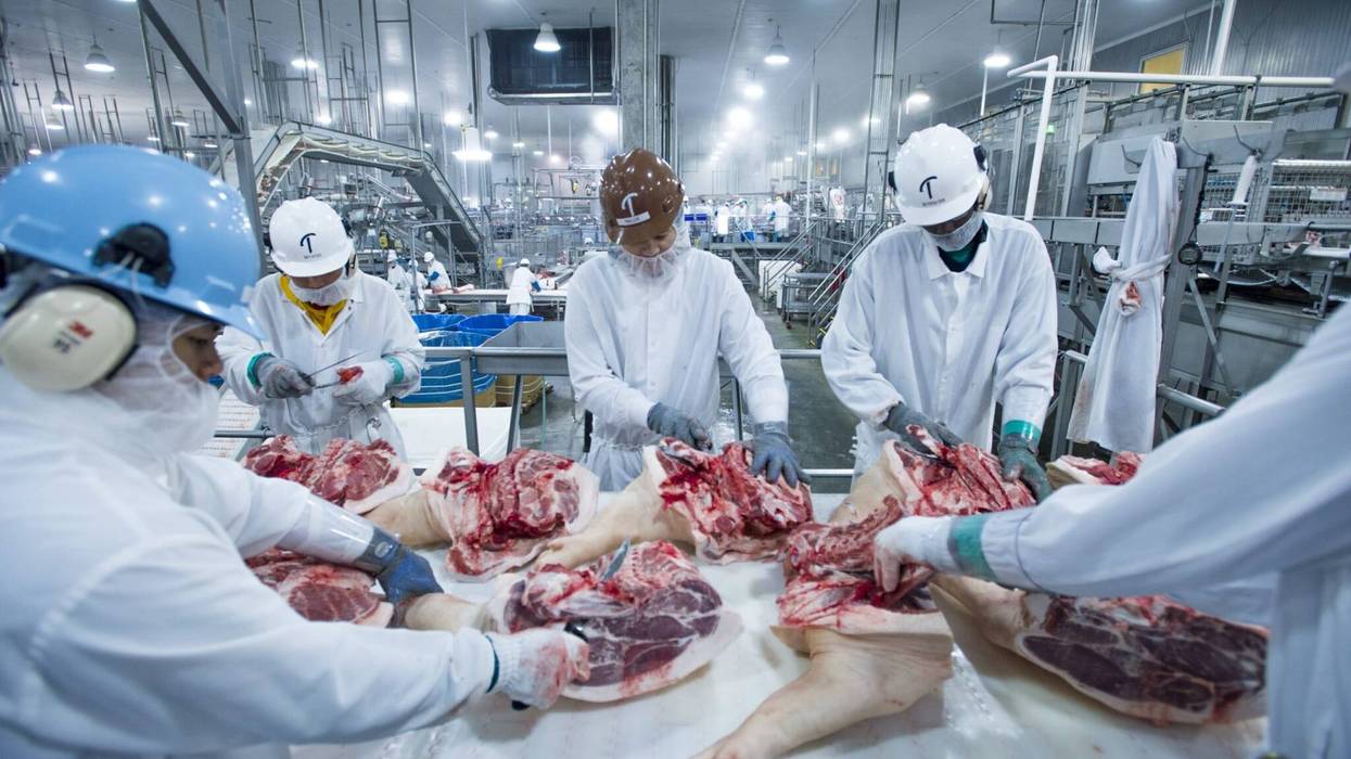 Meatpackers at work