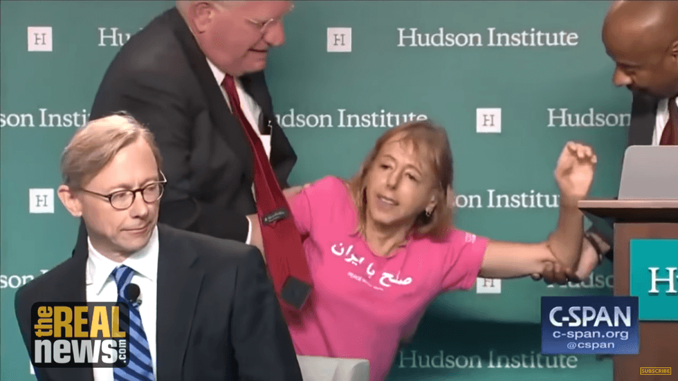 Medea Benjamin confronts