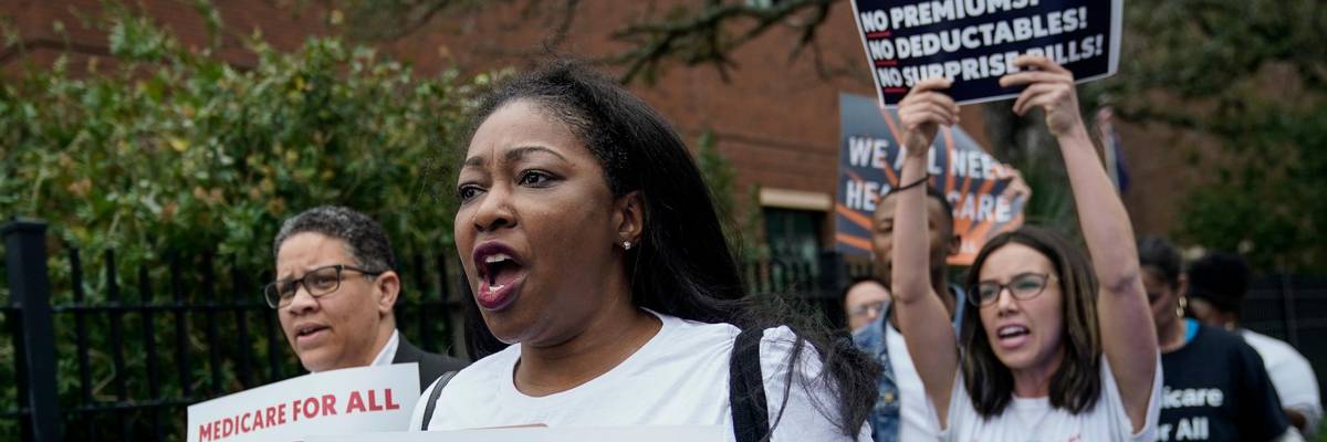 Medicare For All supporters demonstrate outside of the Charleston Gaillard Center ahead of the Democratic presidential debate on February 25, 2020 in Charleston, South Carolina. (Photo: Drew Angerer via Getty Images)