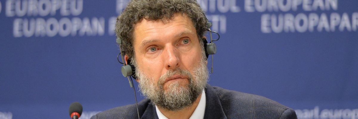 Member of the International Peace and Reconciliation Initiative (IPRI) delegation to Turkey Osman Kavala is seen during a joint press conference after the 11th International Conference on the European Union, Turkey, the Middle East and the Kurds at European Parliament headquarters in Brussels on December 11, 2014. (Photo: Dursun Aydemir/Anadolu Agency/Getty Images)