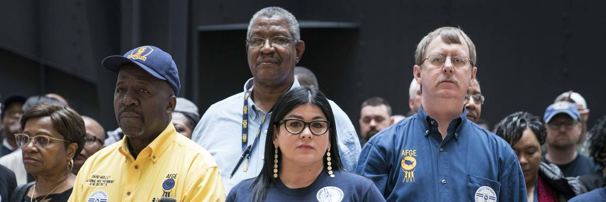 Members and supporters of the American Federation of Government Employees participate in a protest in the Hart Senate Office Building Atrium in Washington, D.C. on February 11, 2020.