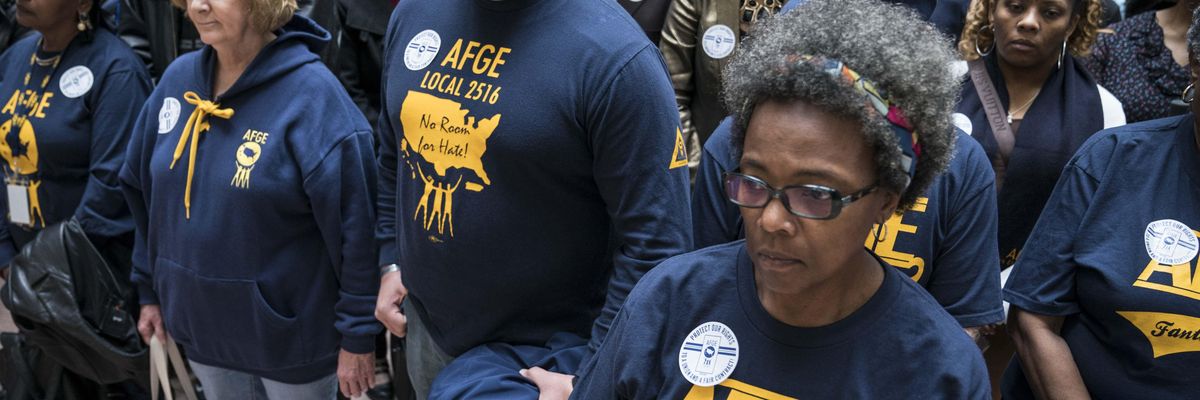 Members and supporters of the American Federation of Government Employees participate in a protest on February 11, 2020 in Washington, D.C.