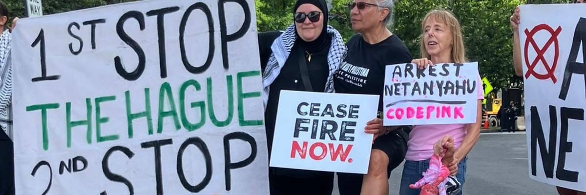 Members of CodePink call for the arrest of Netanyahu