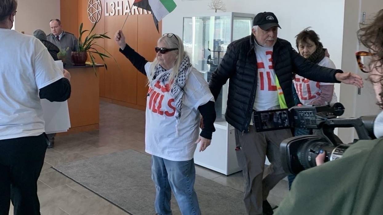 Members of Demilitarize Western Massachusetts occupy the lobby of L3Harris plant in Northampton, Massachusetts on March 19, 2025.