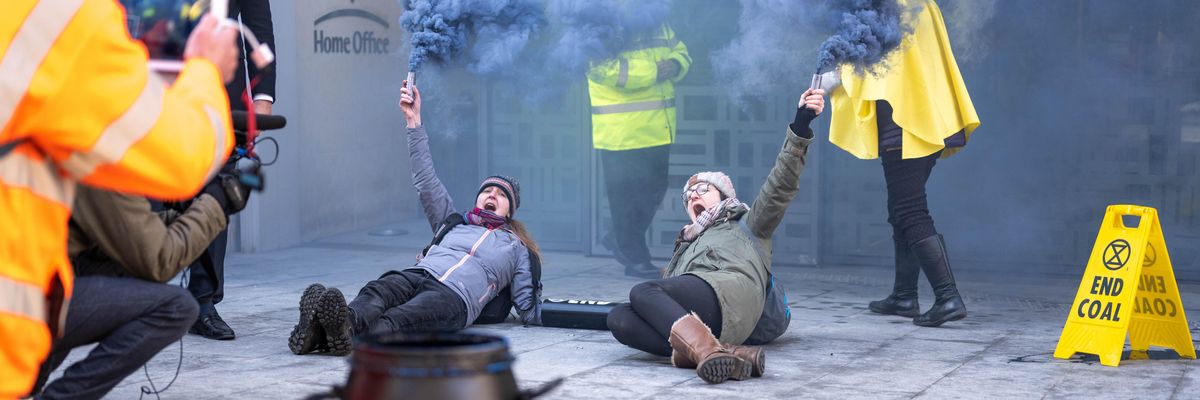 Members of Extinction Rebellion protested coal mining at the U.K. Department for Leveling Up, Housing, and Communities