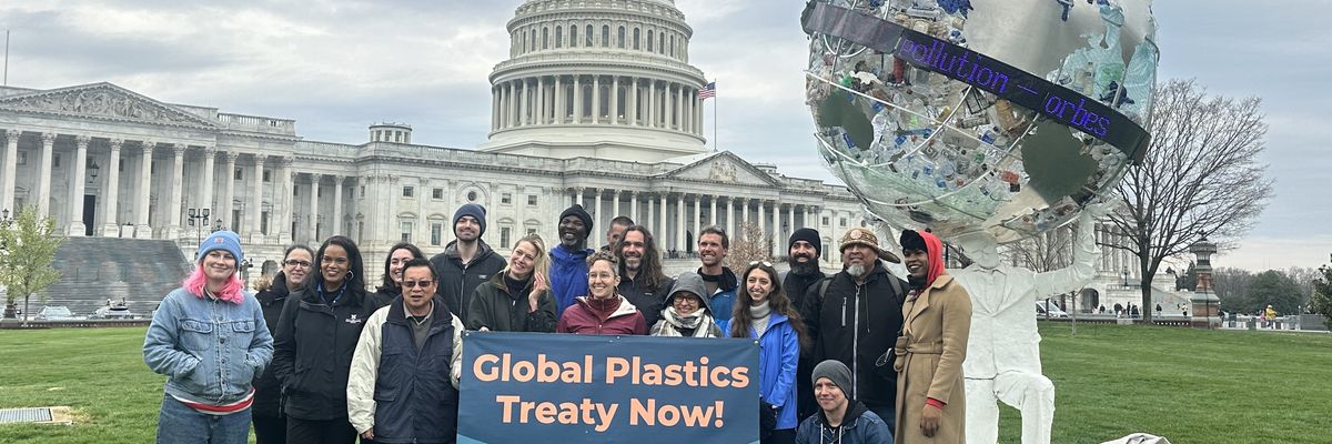 Members of Greenpeace USA and monument