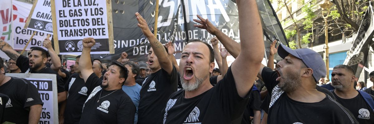Members of the Argentinian Tire Workers' Union and other protesters demonstrate