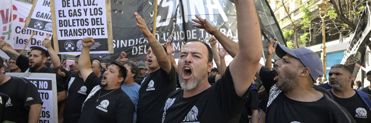Members of the Argentinian Tire Workers' Union and other protesters demonstrate 