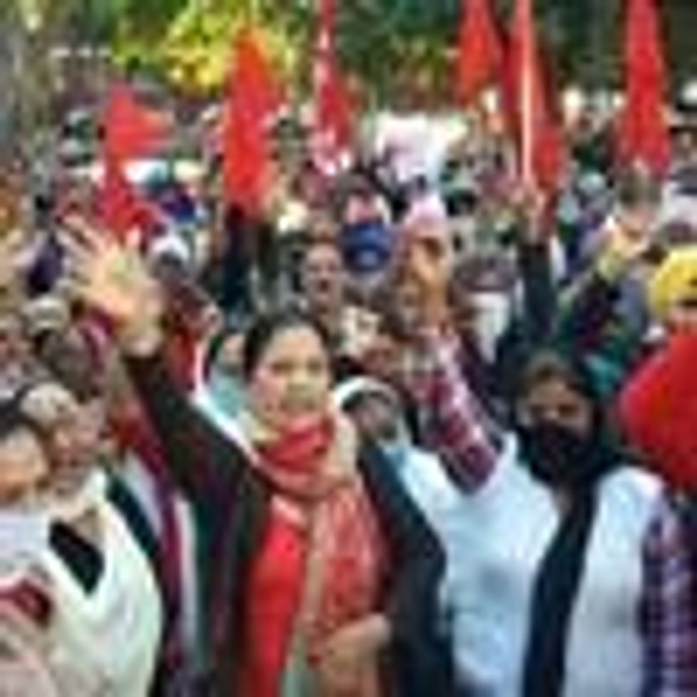 Members of the Communist Party of India protest as part of a nationwide strike on November 26, 2020. (Photo: Sameer Sehgal/Hindustan Times/Getty Images)