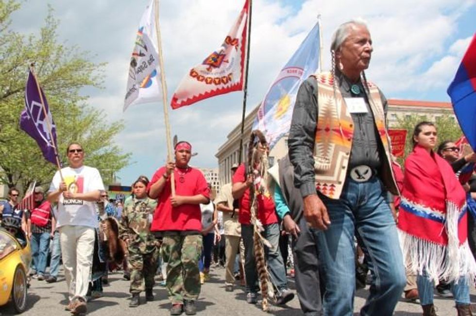 Members of the Cowboy Indian Alliance march through Washington, DC last week. (WNV / Kristin Moe)