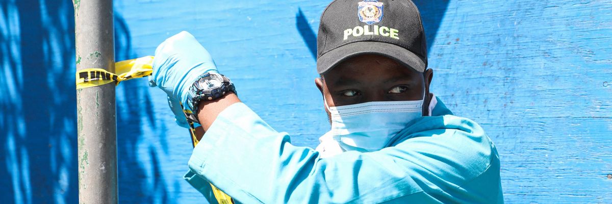 Members of the Haitian police and forensic investigators look for evidence outside of the residence of assassinated Haitian President Jovenel Moïse on July 7, 2021 in Port-au-Prince. (Photo: Valerie Baeriswyl/AFP via Getty Images)
