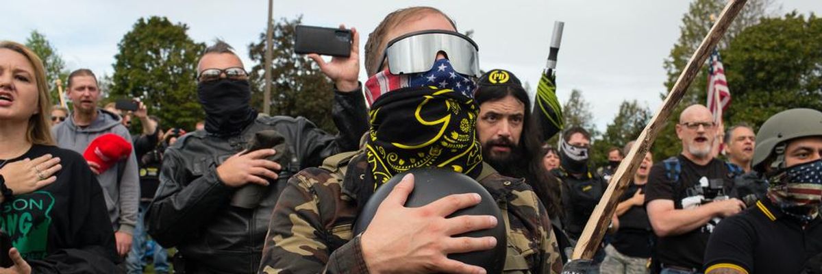 Members of the Proud Boys, a gang that supports President Trump, hold a rally on September 26, 2020 in Delta Park on the edge of Portland, Oregon.