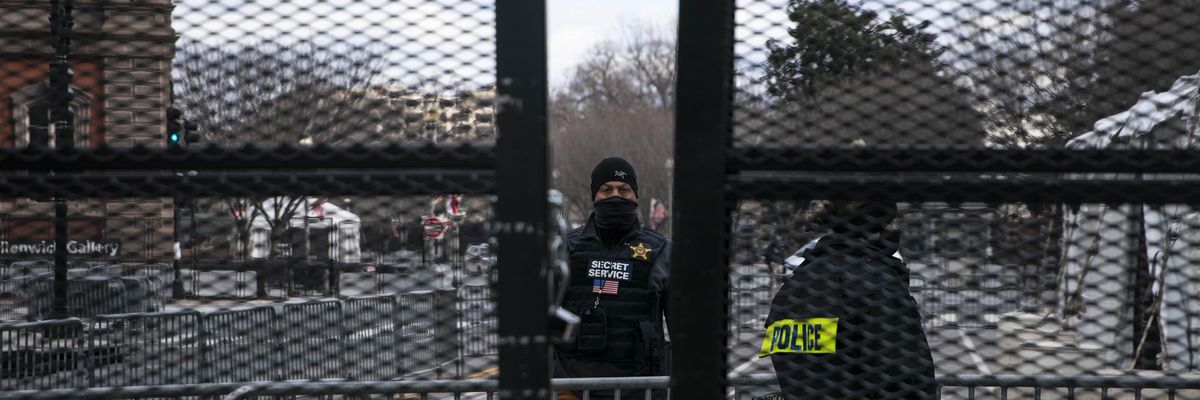 Members of the Secret Service guard the expanded protective perimeter around the White House on January 17, 2021 in Washington, D.C.
