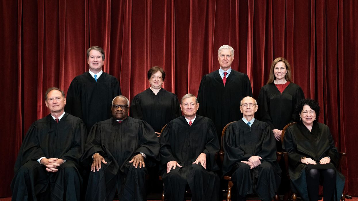 Members of the U.S. Supreme Court pose for a group photo in Washington, D.C. on April 23, 2021.