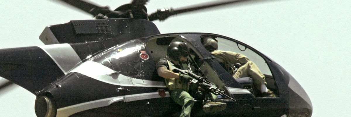 Members of the US Blackwater mercenary outfit in 2004 over Baghdad