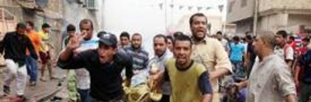 Scores Killed in Iraq Blasts