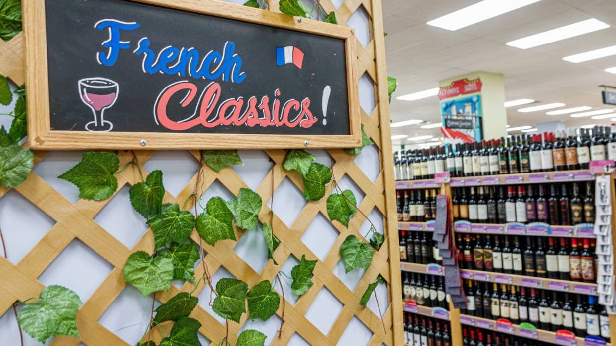 Miami Beach, Florida, Trader Joe's grocery store, chalkboard sign French classics, shelves wine bottles display