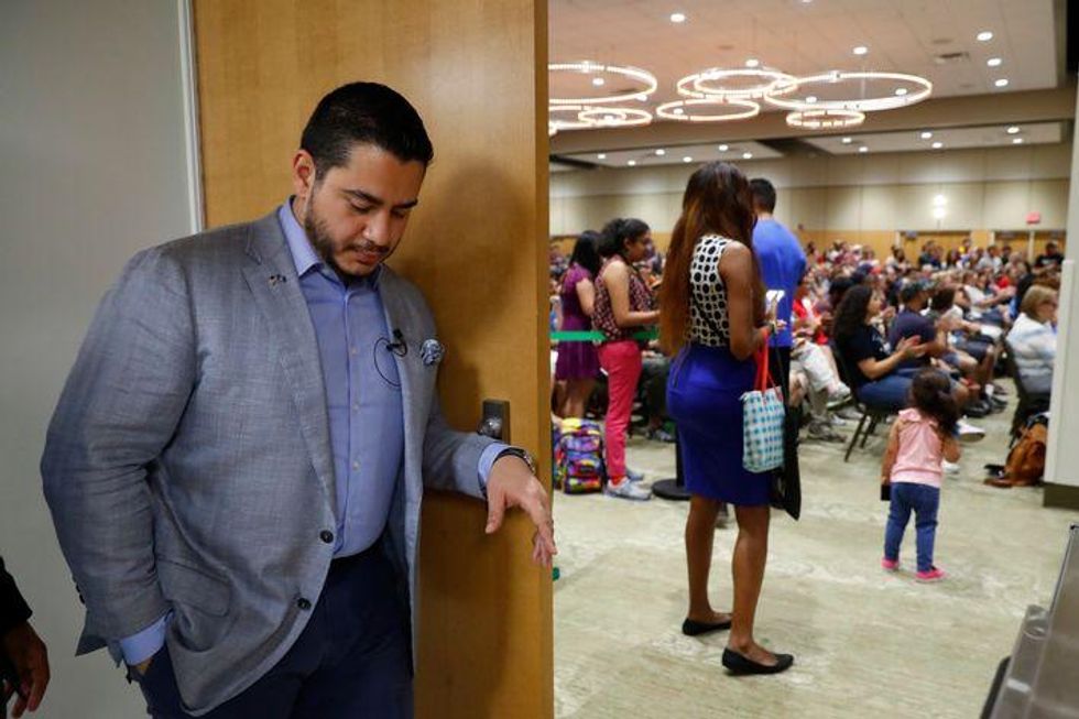 Michigan Democratic gubernatorial candidate Abdul El-Sayed waits to speak at a campaign stop in Detroit, Saturday, July 28, 2018.