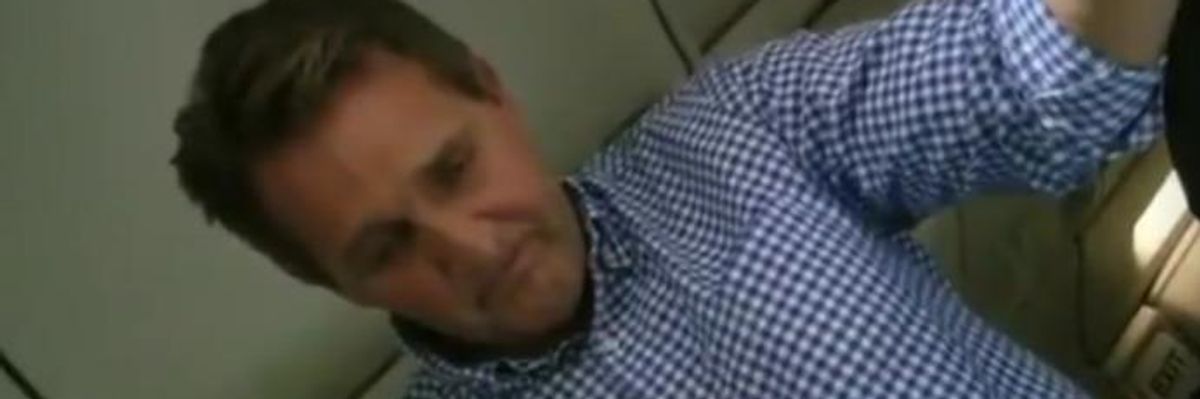 'You Can Save My Life': Traveling on Same Plane, Man With ALS Confronts Sen. Flake Over GOP Tax Bill