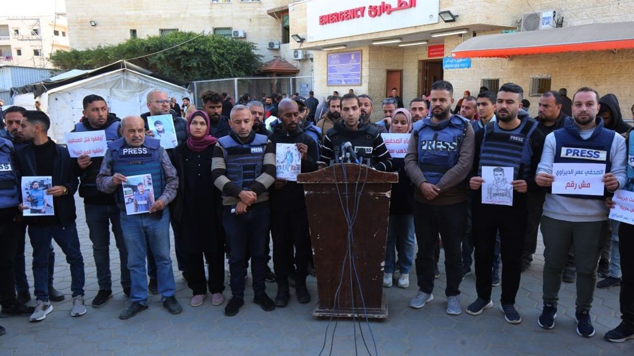 MIDEAST-GAZA-DEIR AL-BALAH-JOURNALISTS-PROTEST