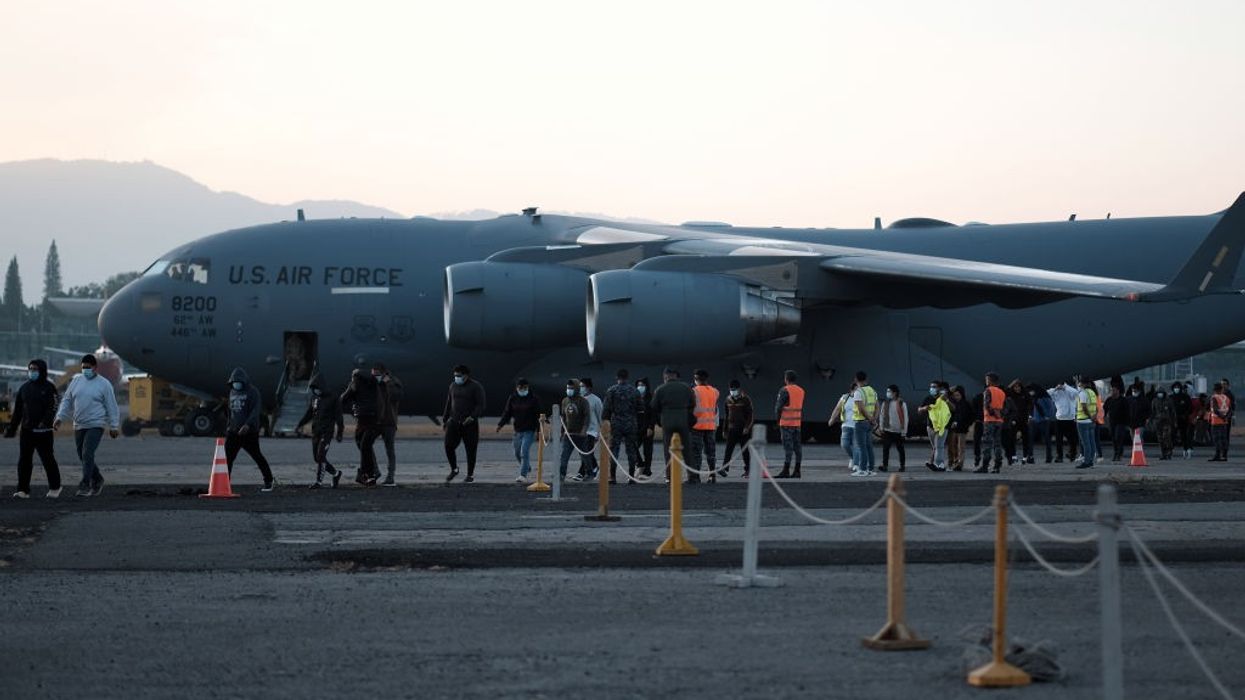 Migrants arrive from US in a military plane at la Aurora air base in Guatemala
