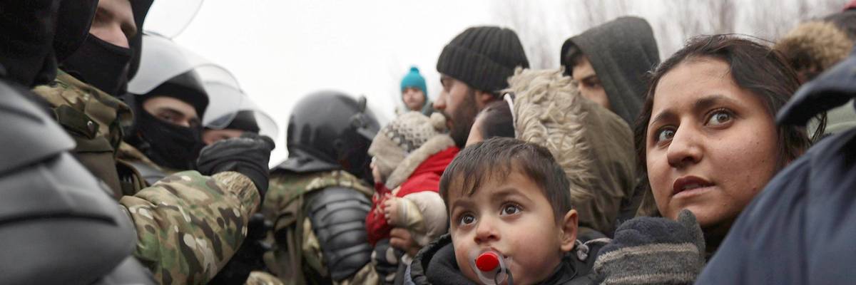 Migrants in a camp at the Polish border