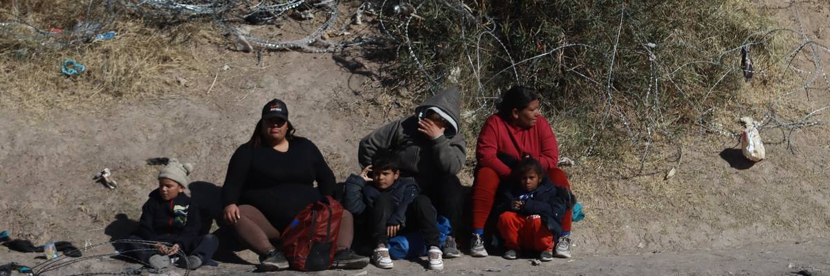 Migrants try to reach the United States border