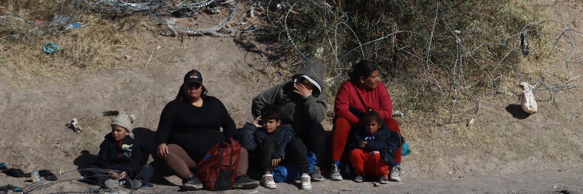 Migrants try to reach the United States border