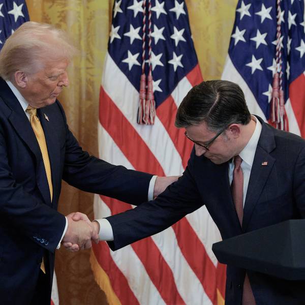 Mike Johnson grovels before Donald Trump, bowing his head while shaking the president's hand