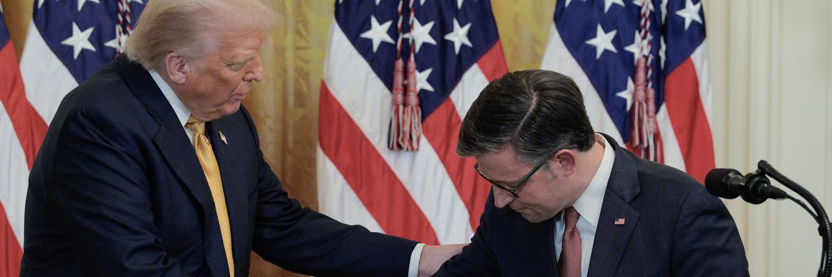 Mike Johnson shake hands with Donald Trump