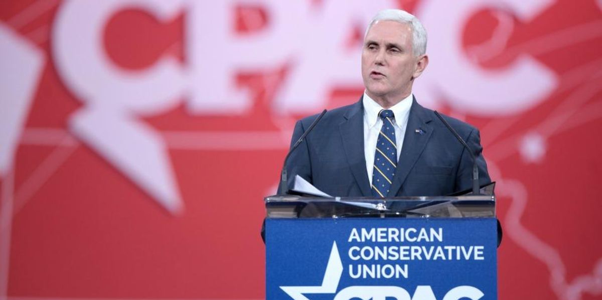 Mike Pence speaks at a podium.