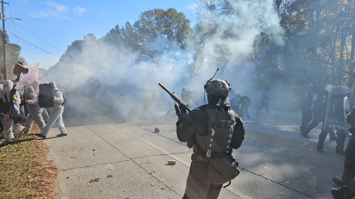 Militarized police attack Stop Cop City protesters with gas and other so-called "less-lethal" weapons