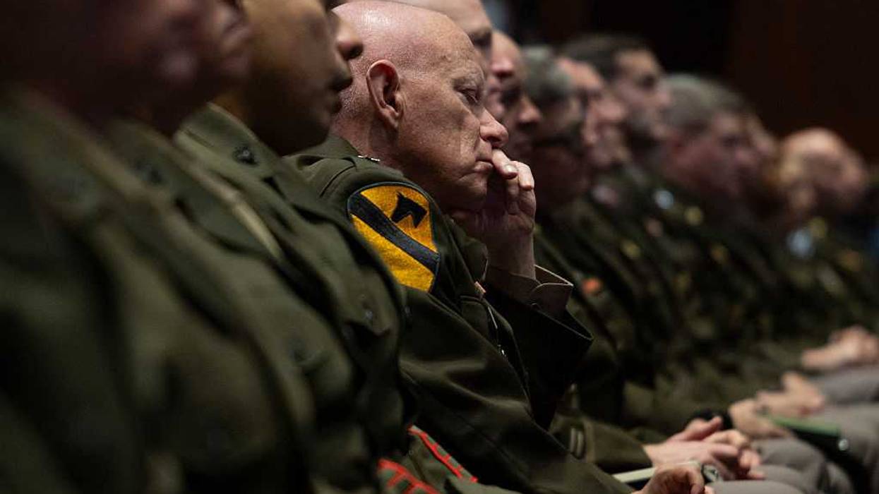 Military leaders listen to Trump