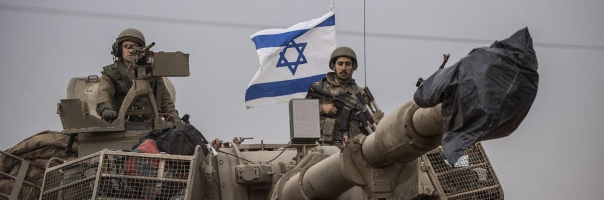 Military vehicles deployed at Gaza border in Sderot