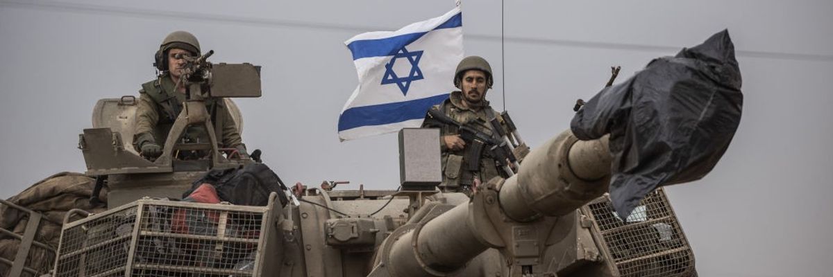 Military vehicles deployed at Gaza border in Sderot